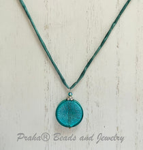 Load image into Gallery viewer, Murano Glass Teal Large Coin Shape on Silk Cord
